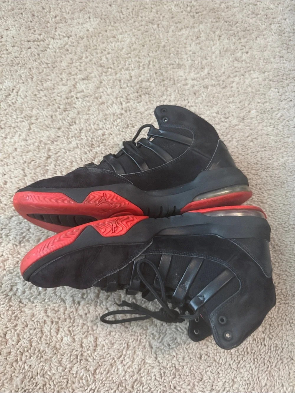 Jordan Black Sneakers with Red Jumpman Accents